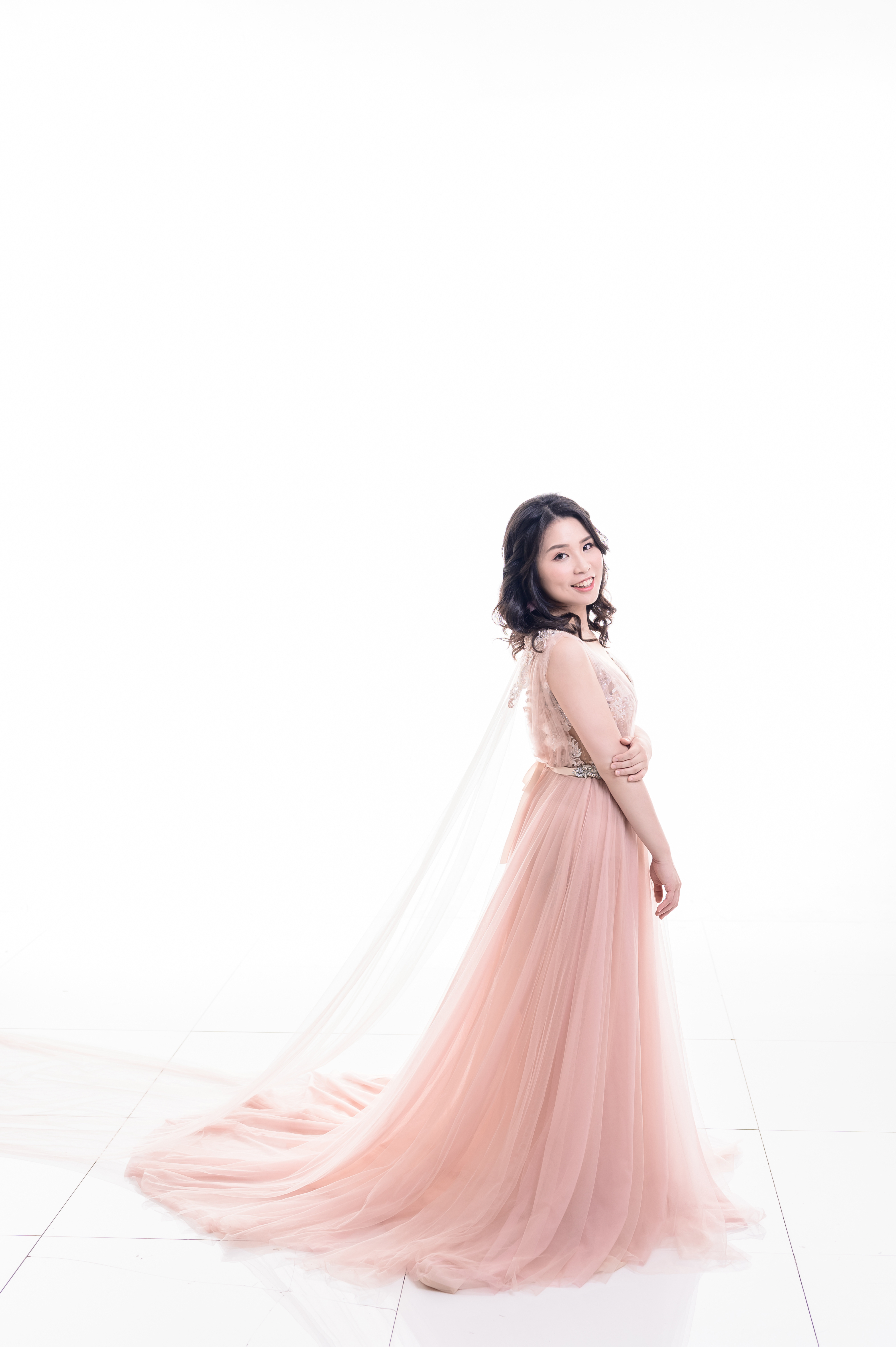 Chiao-Yu Wu in a blush evening gown