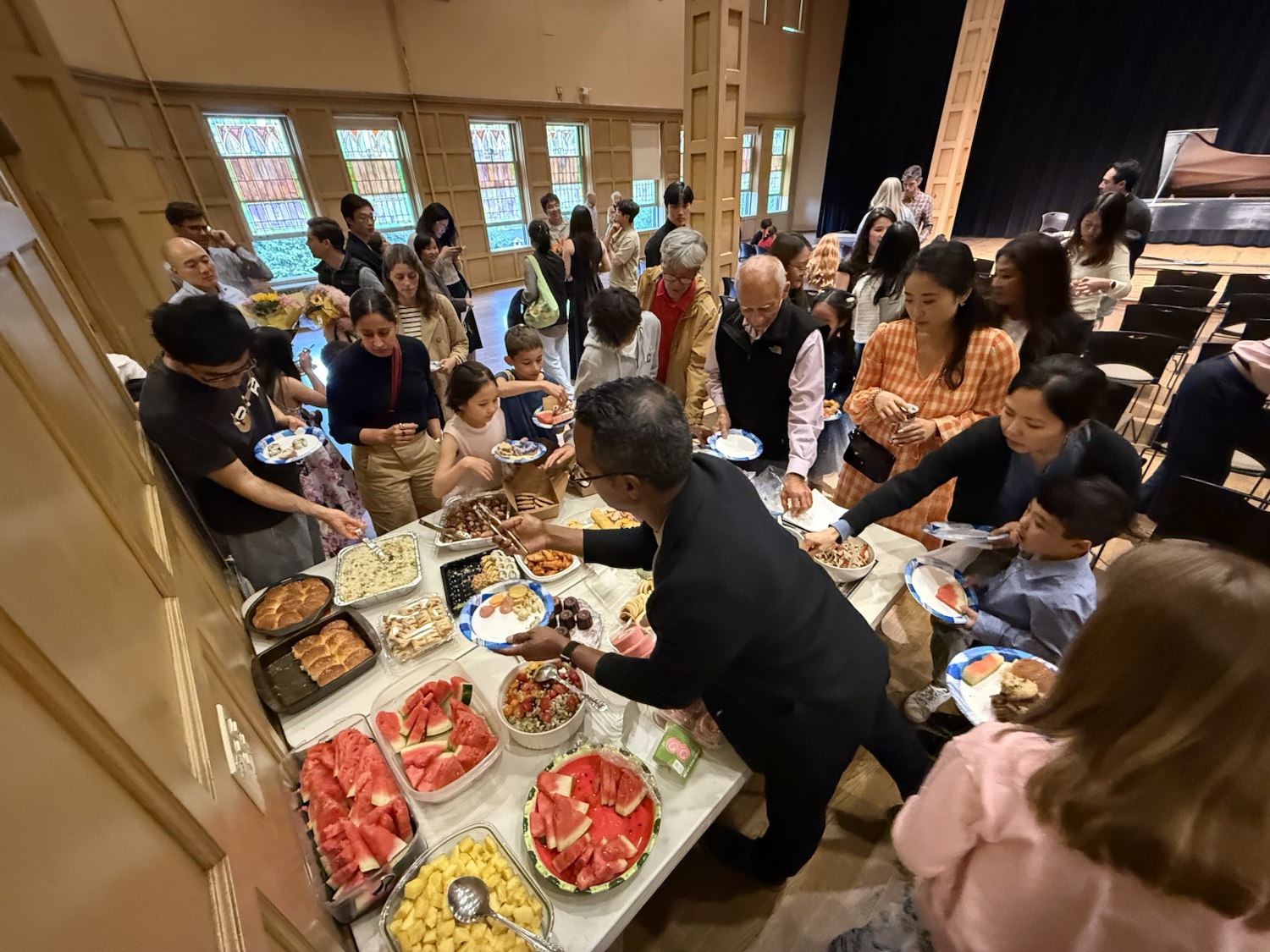 Students and families enjoying the post-recital reception
